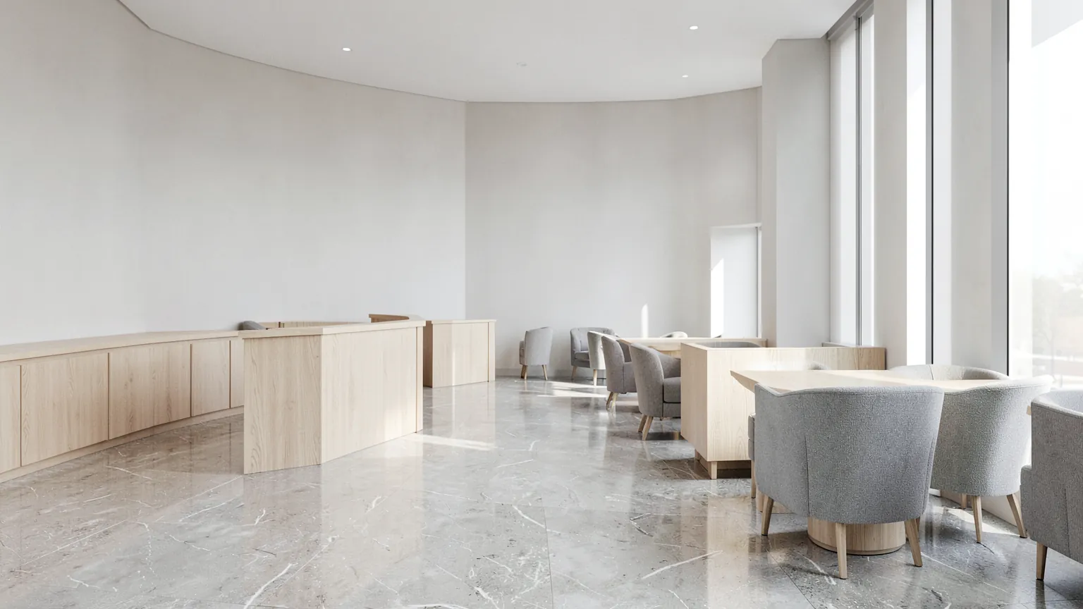 Interior de una oficina bancaria moderna con mostradores de madera clara y grandes ventanales